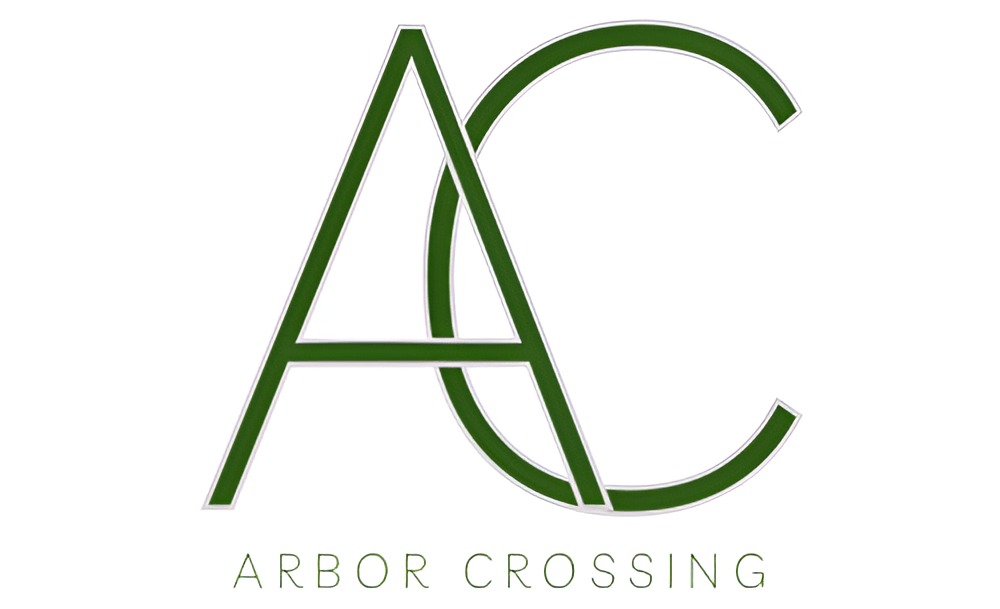 A green logo with the letters A and C intertwined and the words "Arbor Crossing" below it.